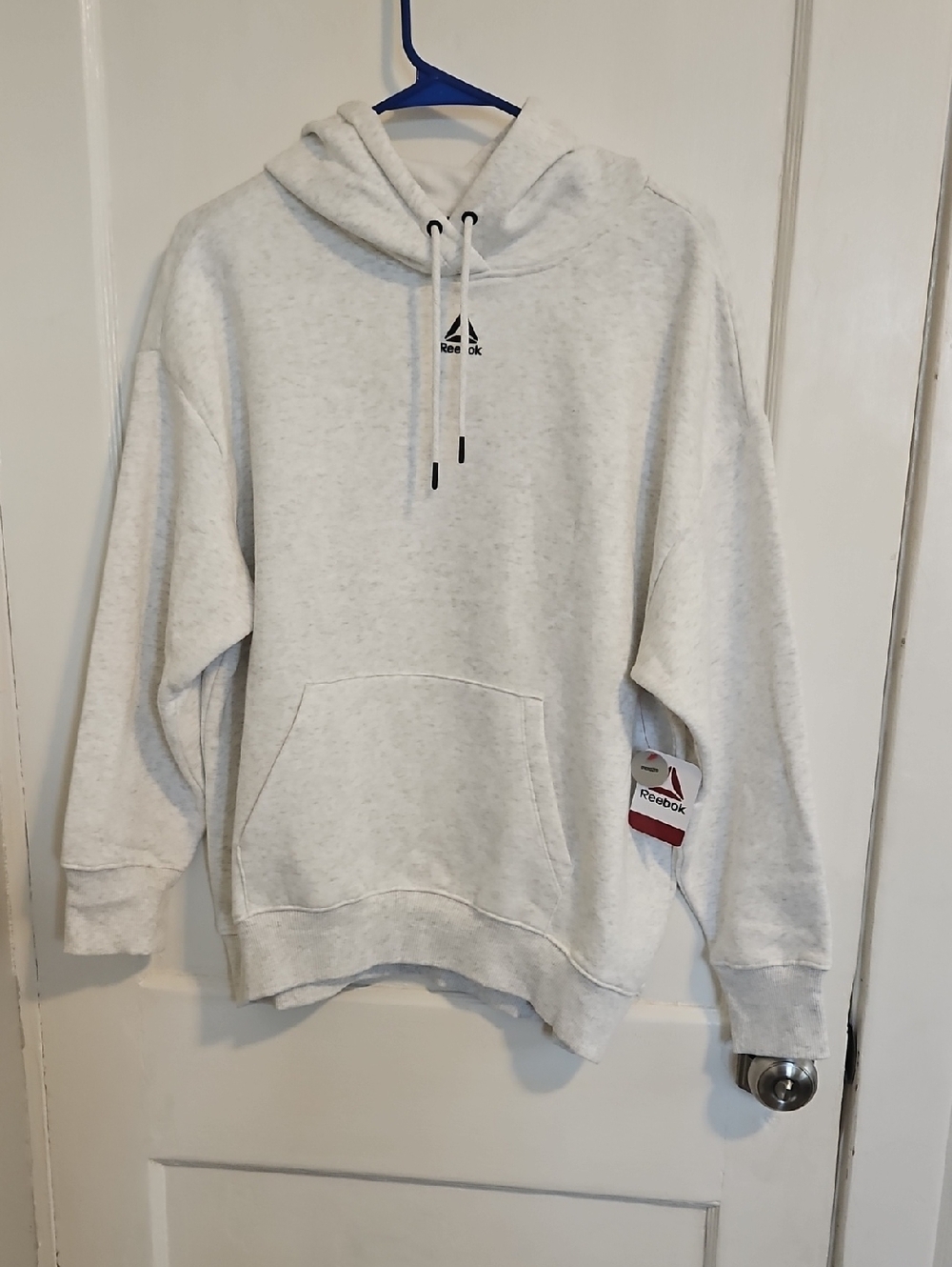 Reebok Light Gray Pullover Hoodie with Subtle Logo